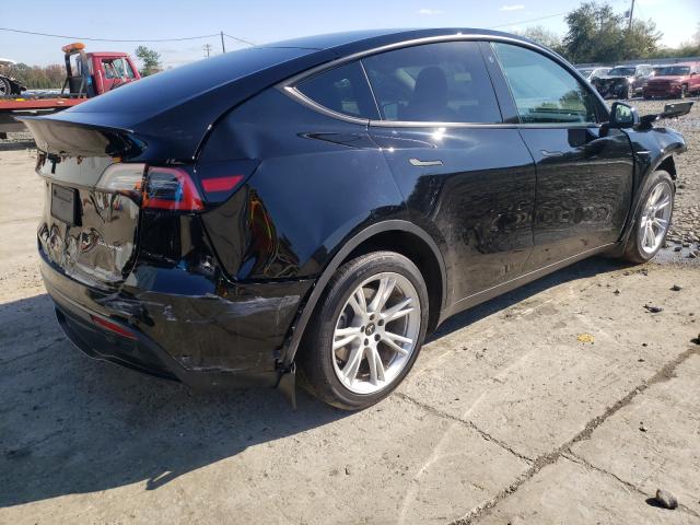 2021 TESLA MODEL Y 5YJYGDEE6MF077120