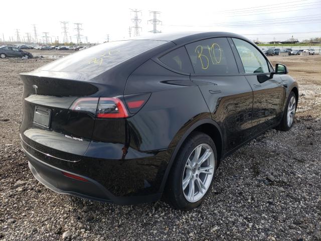2021 TESLA MODEL Y 5YJYGDEE7MF082097