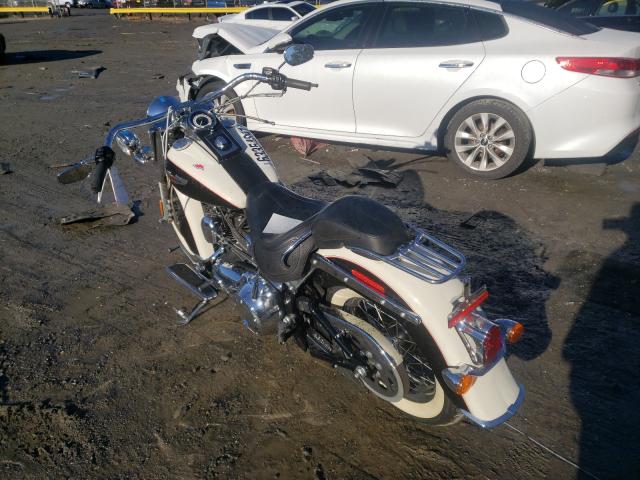 2011 HARLEY-DAVIDSON FLSTN 1HD1JD538BB015511