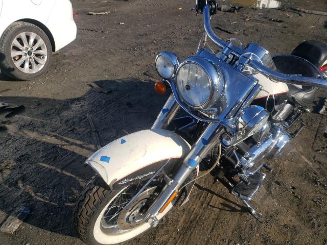 2011 HARLEY-DAVIDSON FLSTN 1HD1JD538BB015511