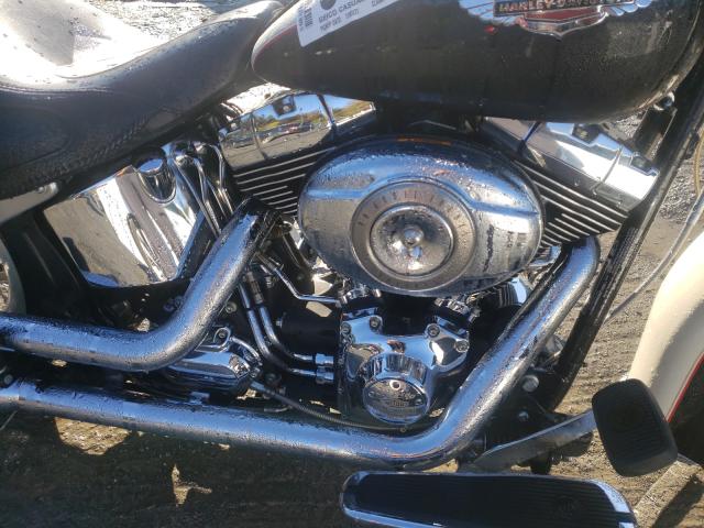 2011 HARLEY-DAVIDSON FLSTN 1HD1JD538BB015511