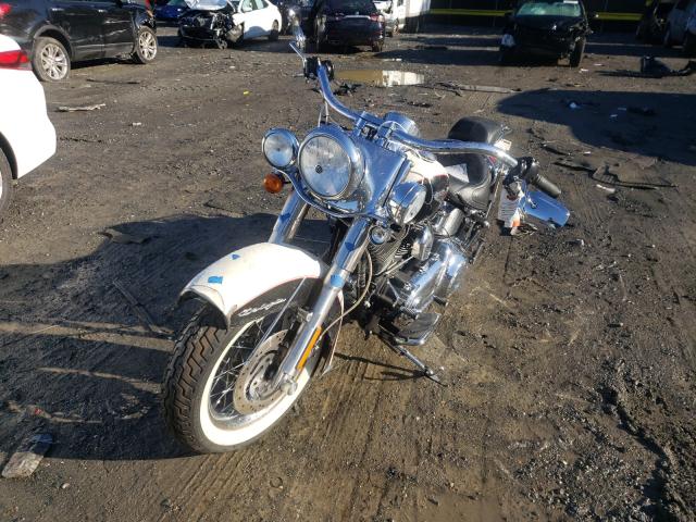 2011 HARLEY-DAVIDSON FLSTN 1HD1JD538BB015511