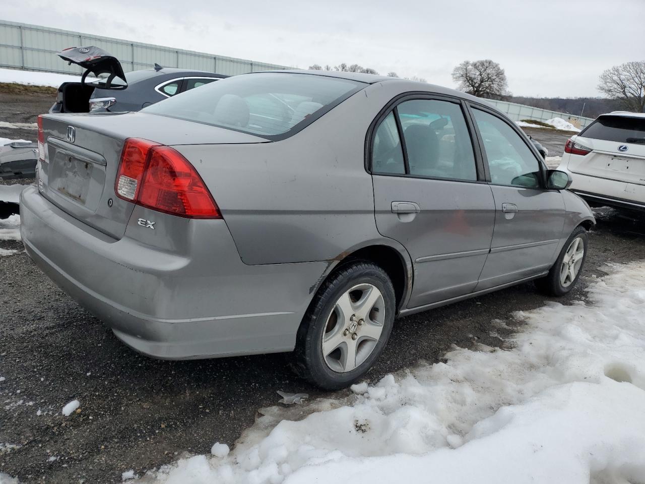 2005 Honda Civic Ex VIN: 1HGES26725L011721 Lot: 40383234