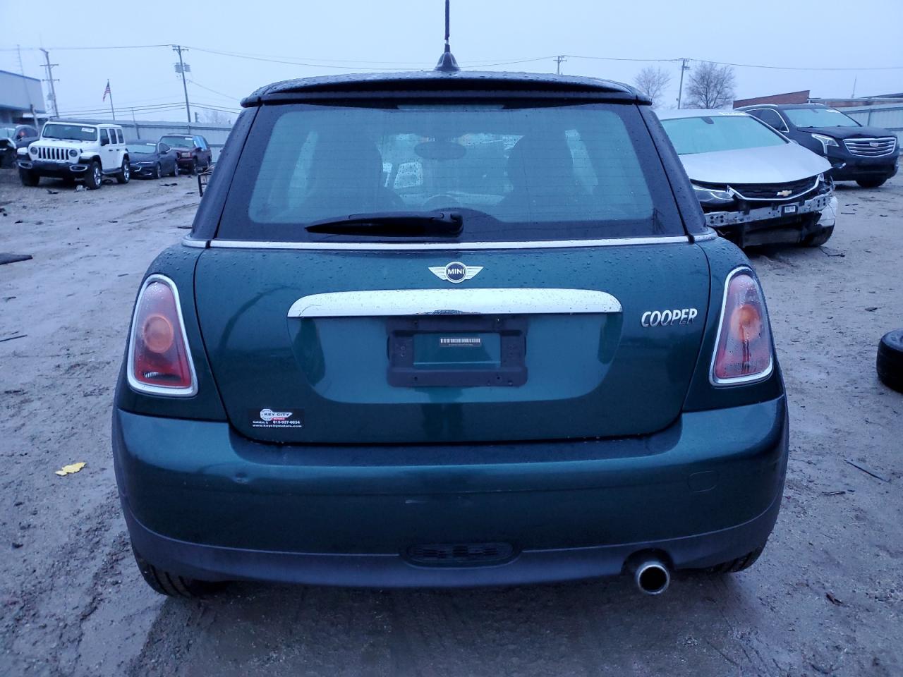 2009 Mini Cooper VIN: WMWMF335X9TW71645 Lot: 40378824