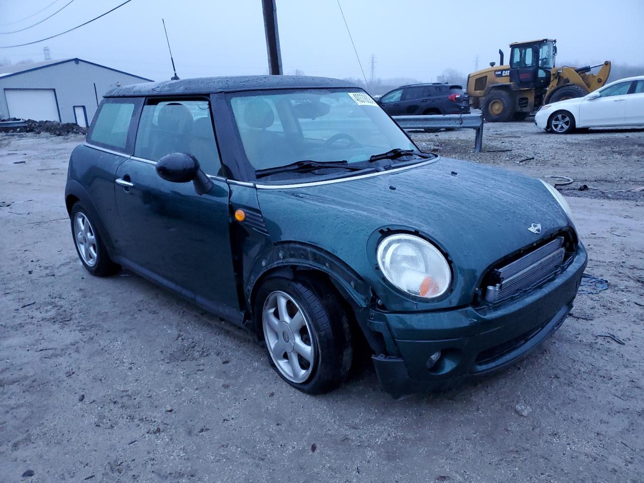 2009 Mini Cooper VIN: WMWMF335X9TW71645 Lot: 40378824