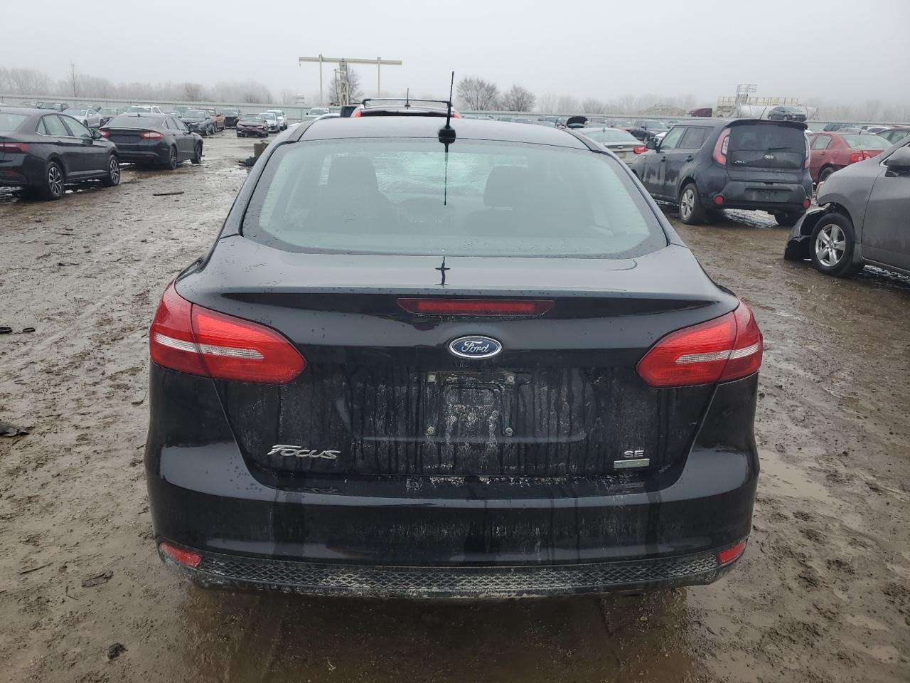 2018 Ford Focus Se VIN: 1FADP3FE0JL301701 Lot: 38981354