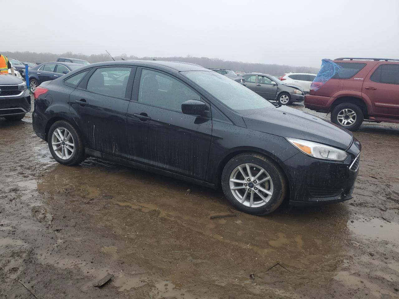 2018 Ford Focus Se VIN: 1FADP3FE0JL301701 Lot: 38981354