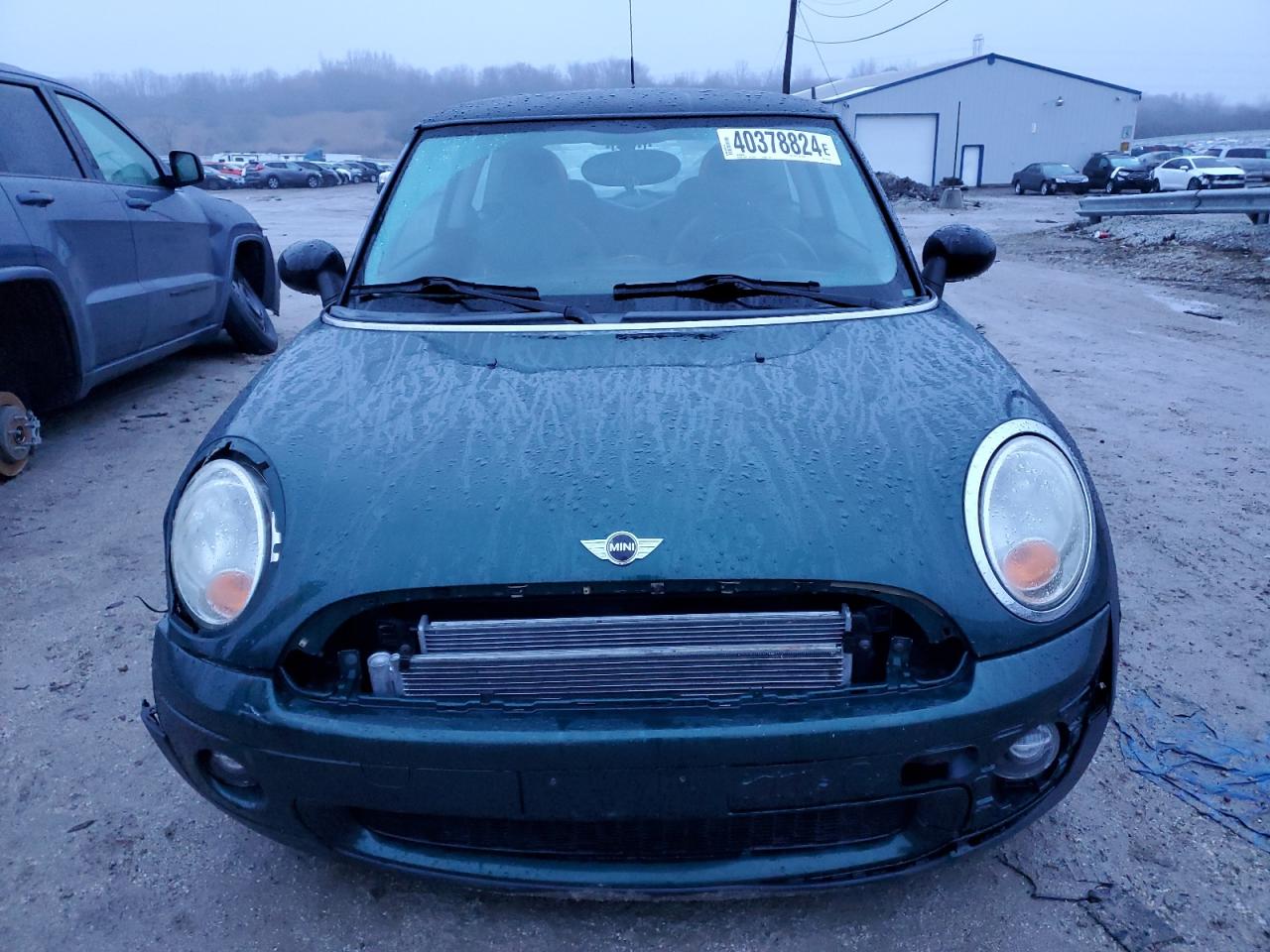 2009 Mini Cooper VIN: WMWMF335X9TW71645 Lot: 40378824