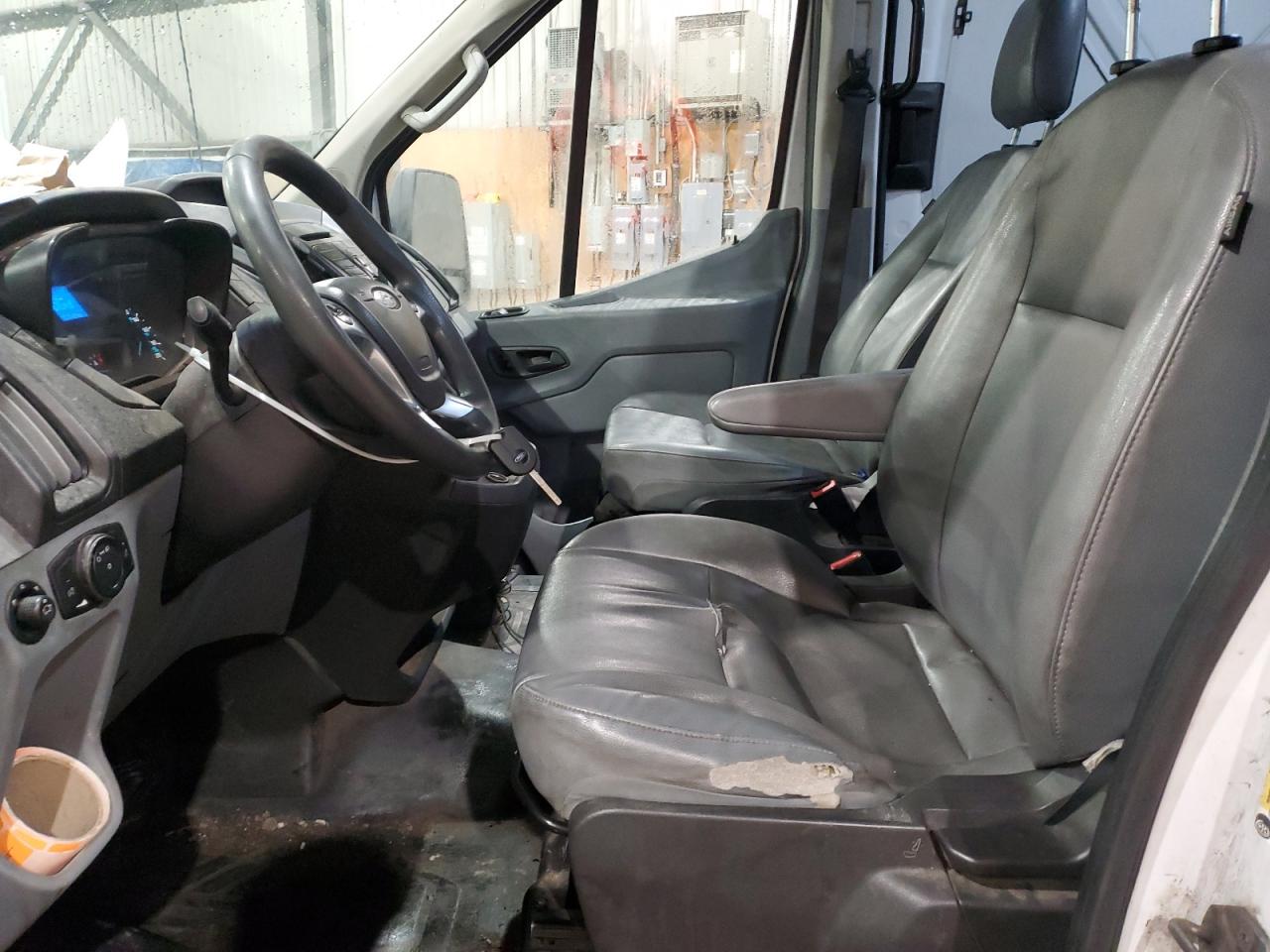 2018 Ford Transit T-150 VIN: 1FTYE2CM7JKB00780 Lot: 39556634
