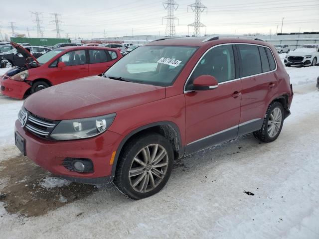  VOLKSWAGEN TIGUAN 2012 Червоний