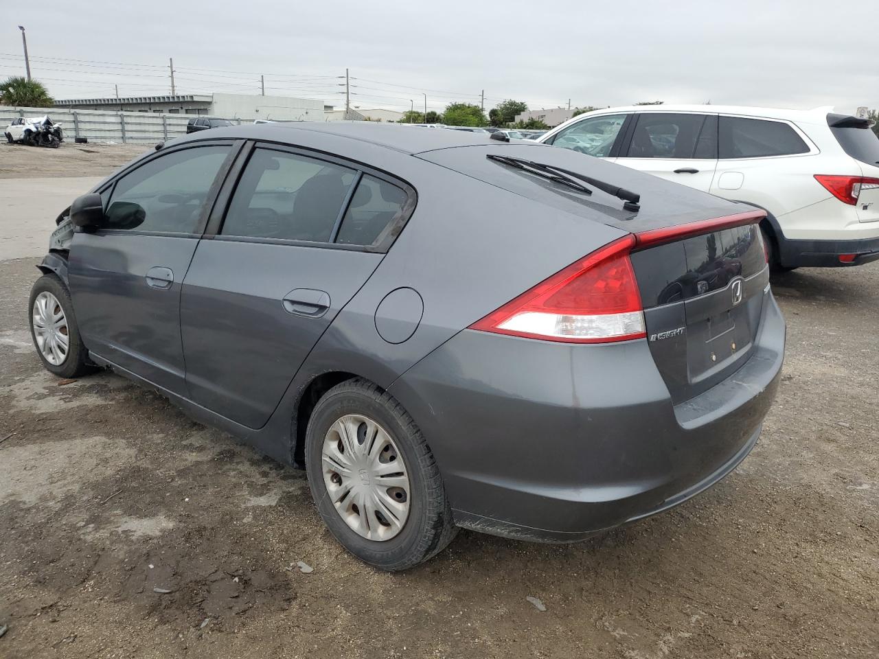 2010 Honda Insight Lx VIN: JHMZE2H54AS032023 Lot: 38306024