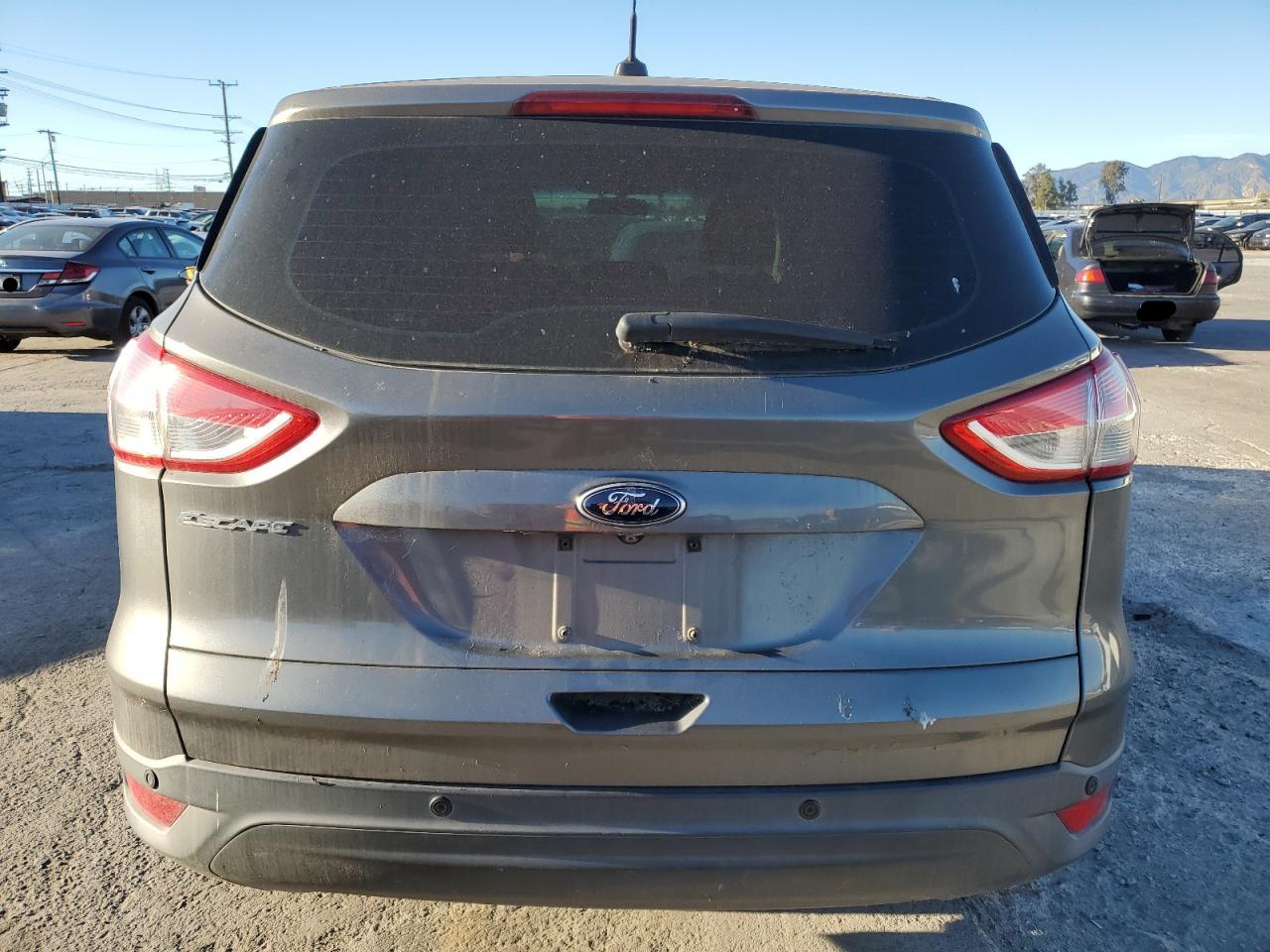 2014 Ford Escape S VIN: 1FMCU0F71EUD25094 Lot: 37175154