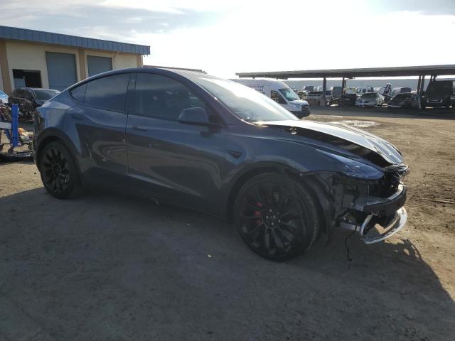  TESLA MODEL Y 2023 Серебристый