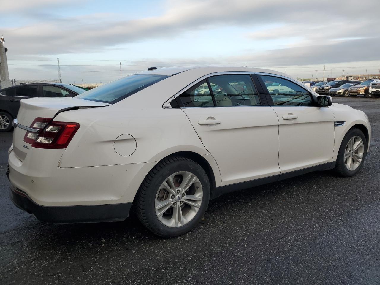 VIN 1FAHP2E82GG144732 2016 FORD TAURUS no.3