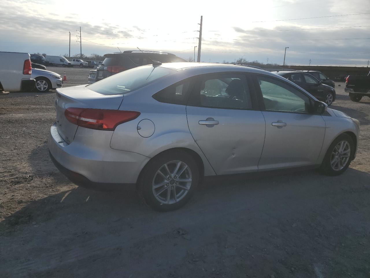 VIN 1FADP3F2XGL293458 2016 FORD FOCUS no.3