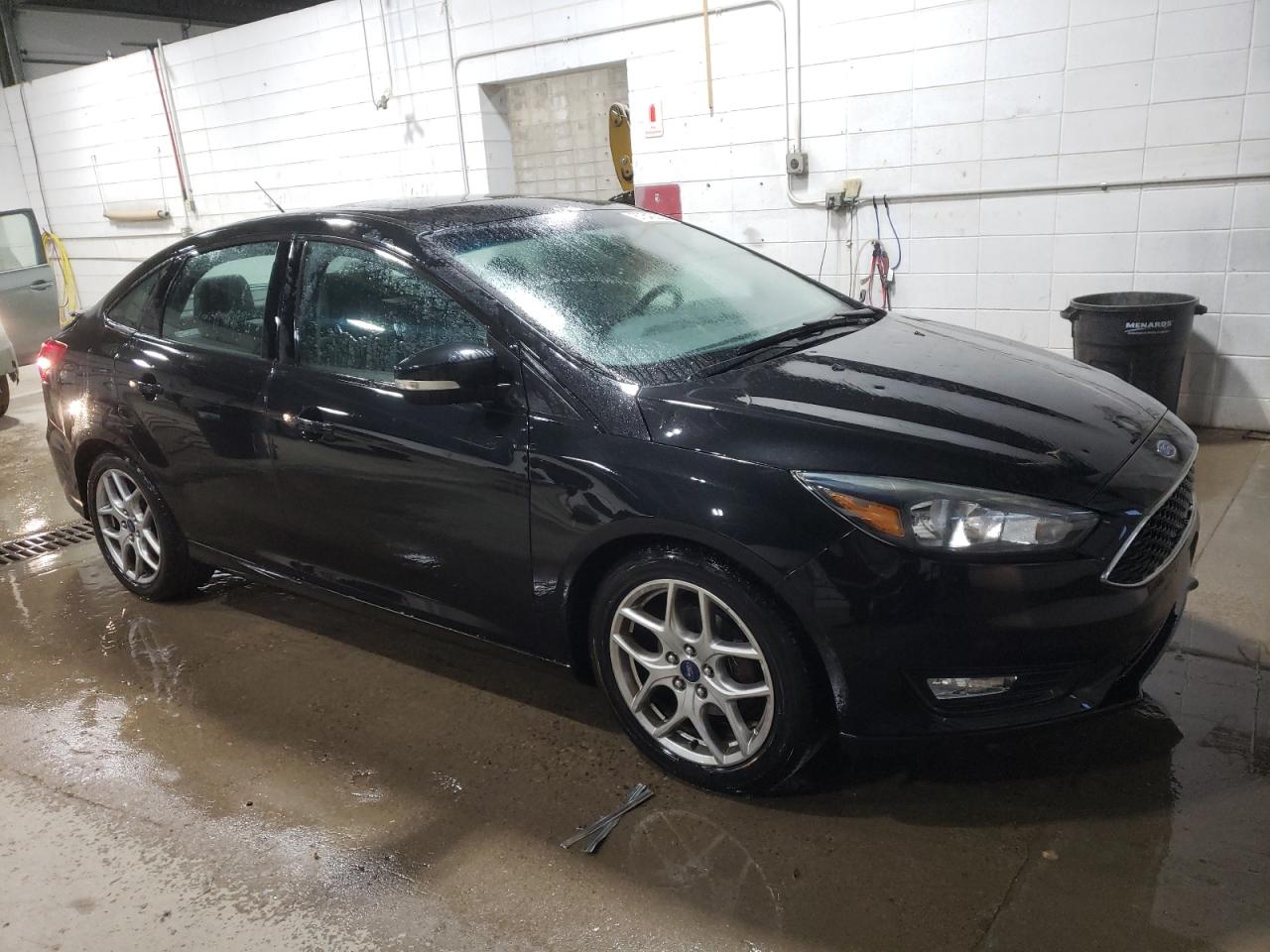 VIN 1FADP3F25FL340166 2015 FORD FOCUS no.4