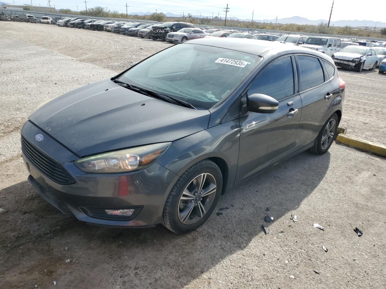 VIN 1FADP3KE7GL301659 2016 FORD FOCUS no.1