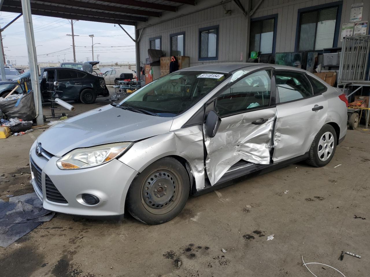 VIN 1FADP3E2XEL169446 2014 FORD FOCUS no.1