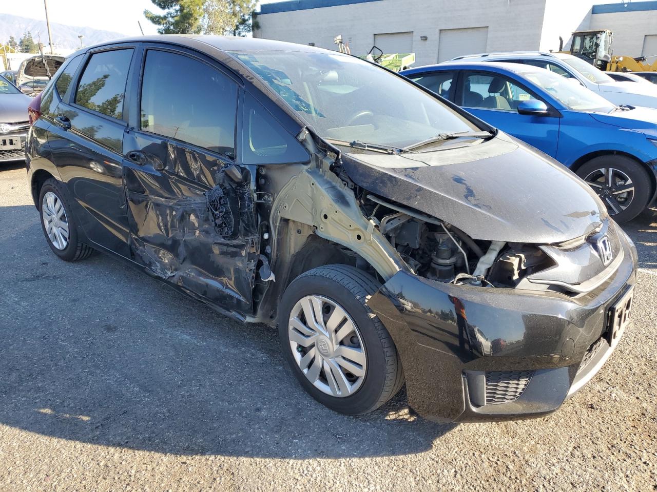 VIN 3HGGK5H56FM769034 2015 HONDA FIT no.4