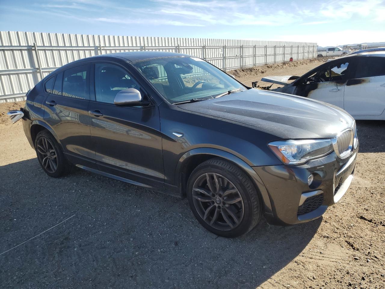 VIN 5UXXW7C53J0W63995 2018 BMW X4 no.4