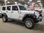 2011 Jeep Wrangler Unlimited Sahara продається в Blaine, MN - All Over