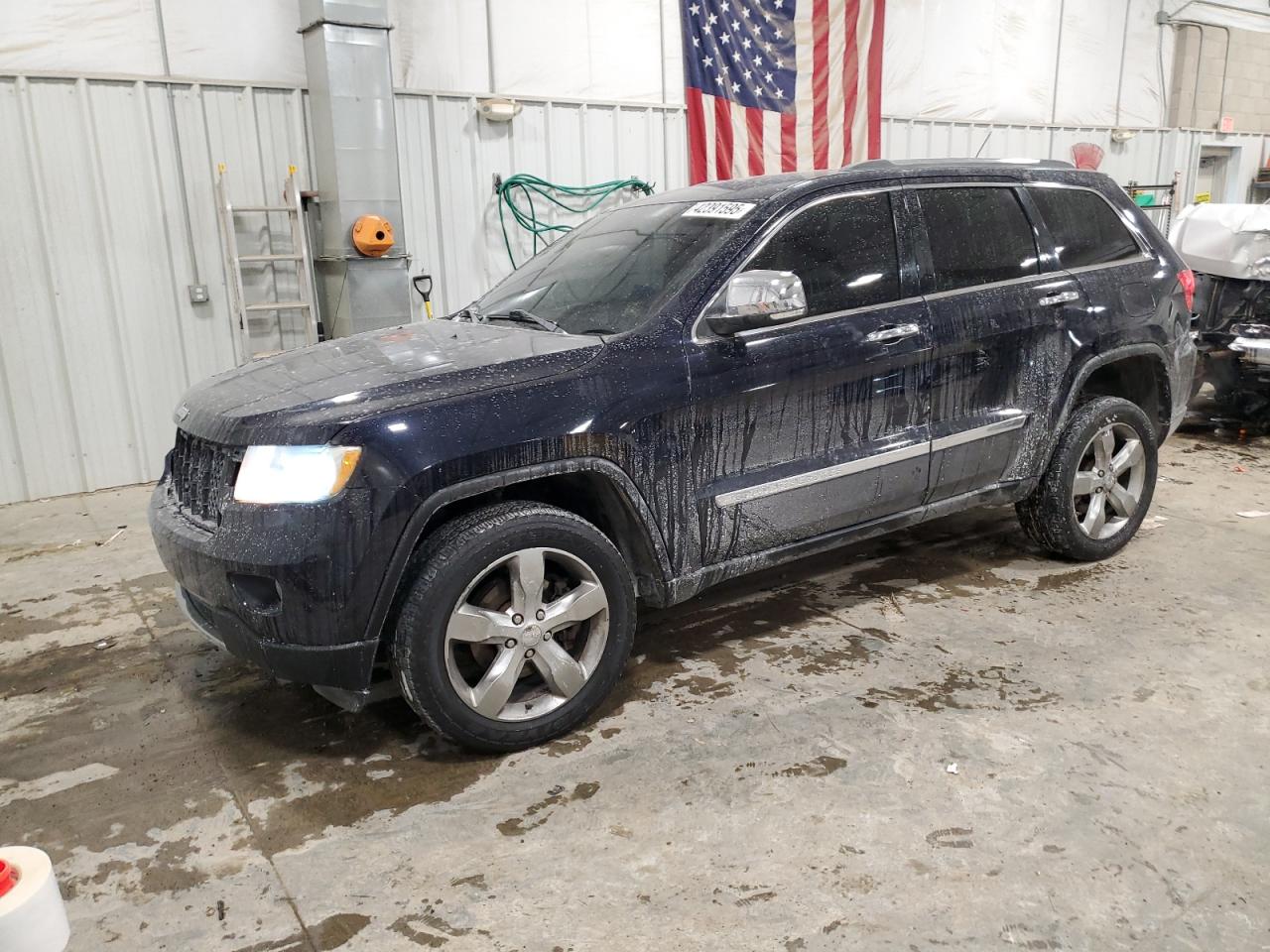 2011 Jeep Grand Cherokee - Image 1