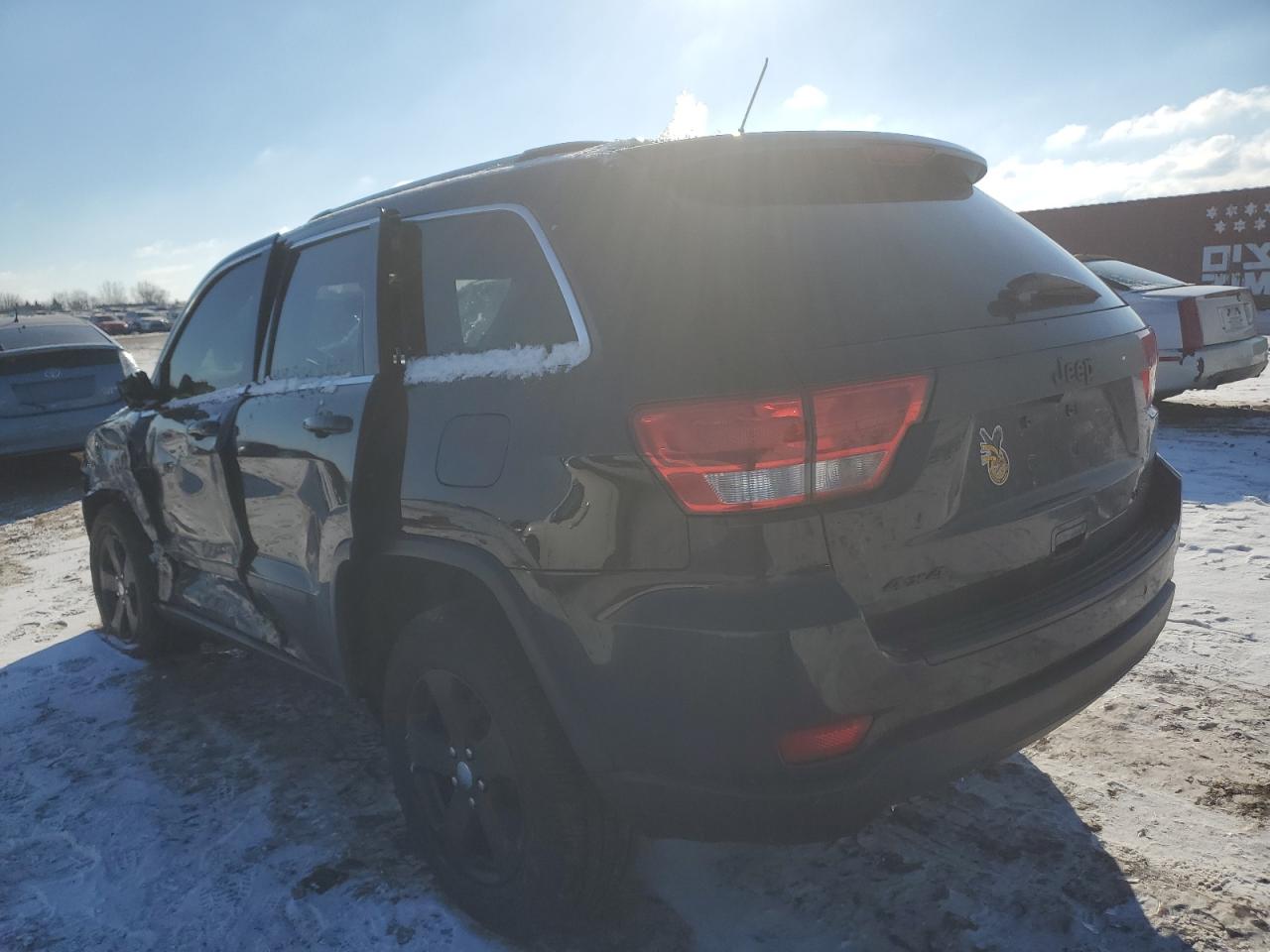 2012 Jeep Grand Cherokee - Image 2