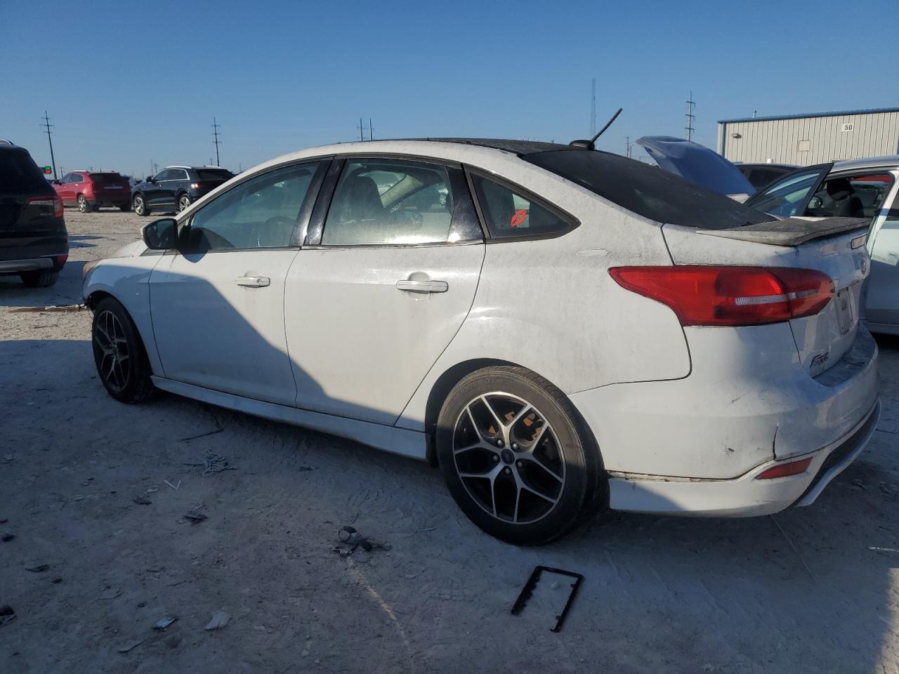 VIN 1FADP3F21GL306212 2016 FORD FOCUS no.2