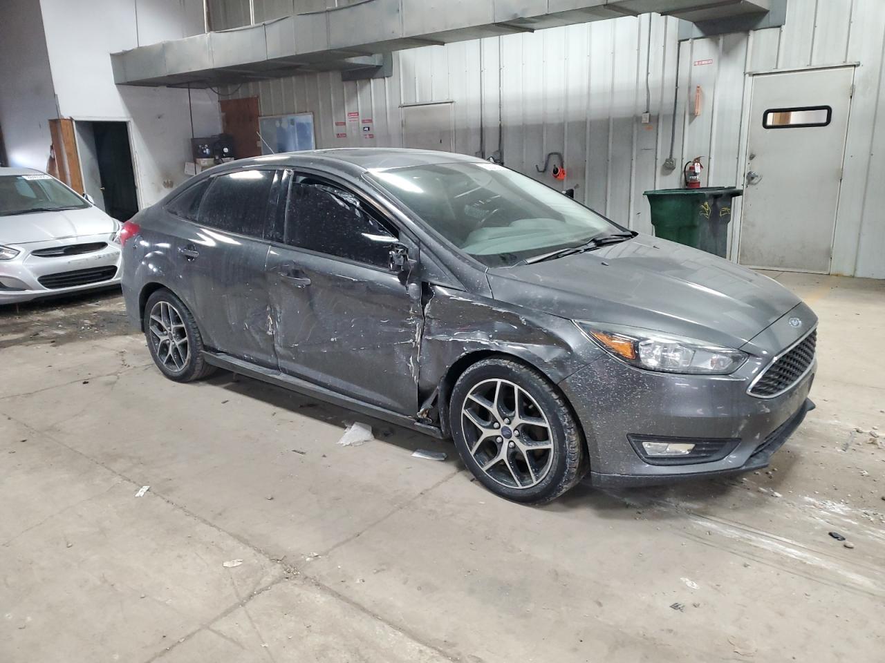 VIN 1FADP3H29HL282739 2017 FORD FOCUS no.4