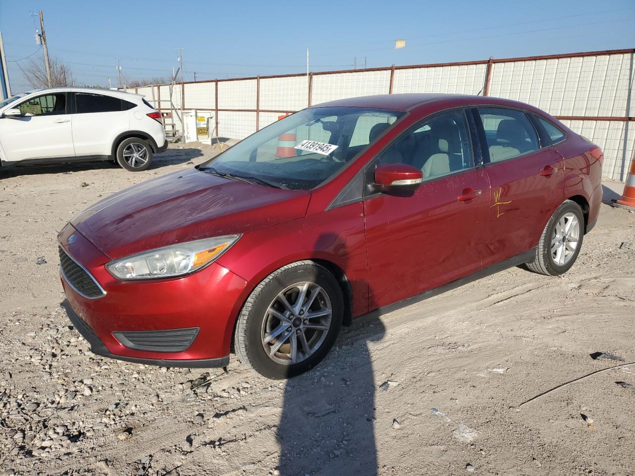 VIN 1FADP3F28GL275203 2016 FORD FOCUS no.1