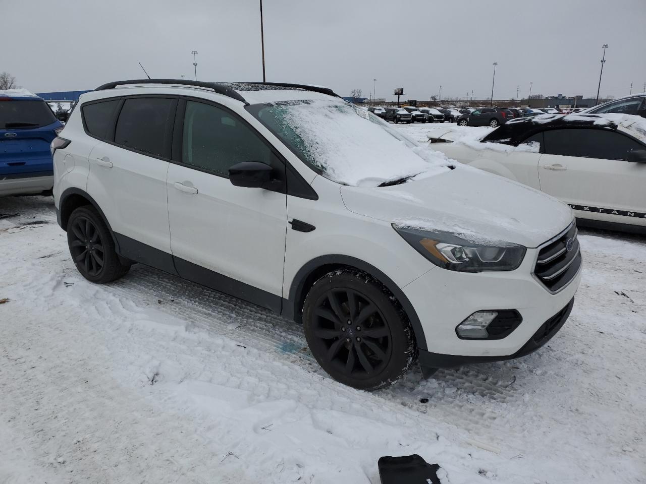 VIN 1FMCU0G96HUB99125 2017 FORD ESCAPE no.4