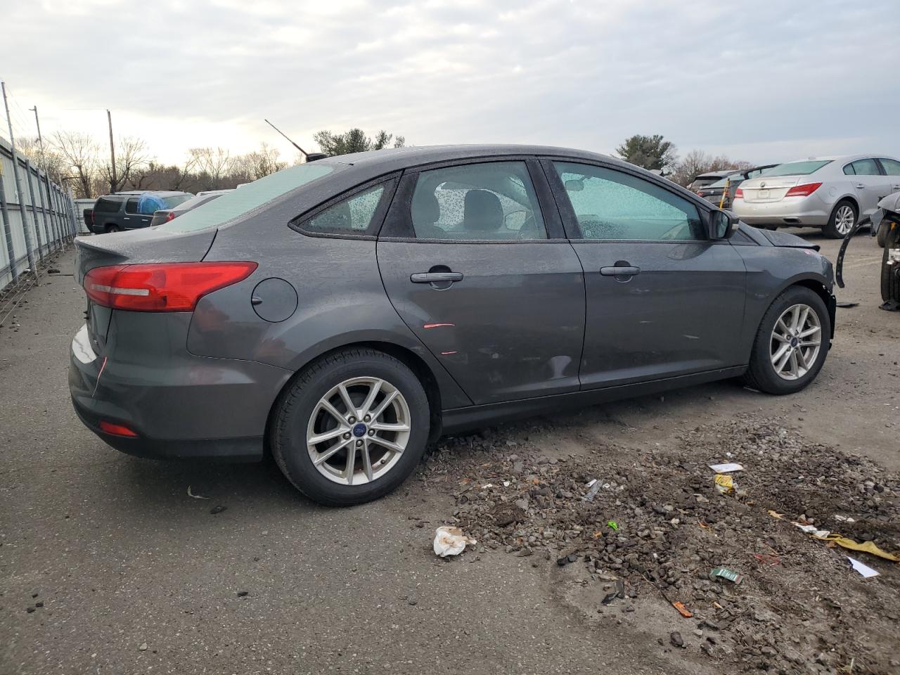 VIN 1FADP3F2XGL334784 2016 FORD FOCUS no.3