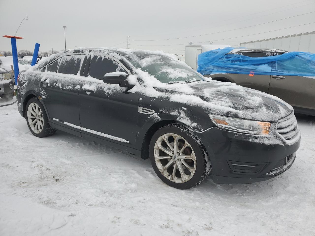 VIN 1FAHP2F83EG110584 2014 FORD TAURUS no.4