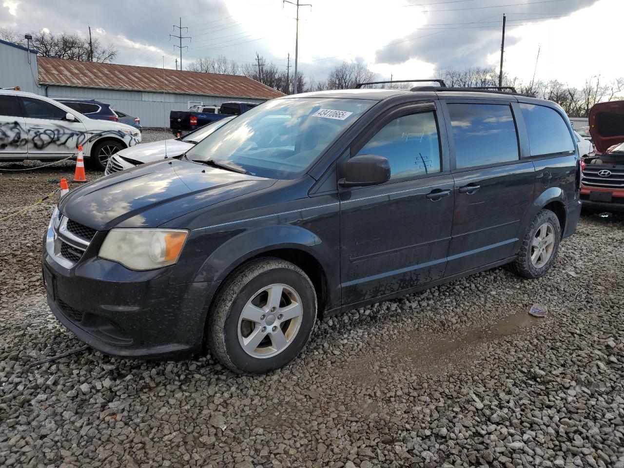 2012 Dodge Caravan - Image 1