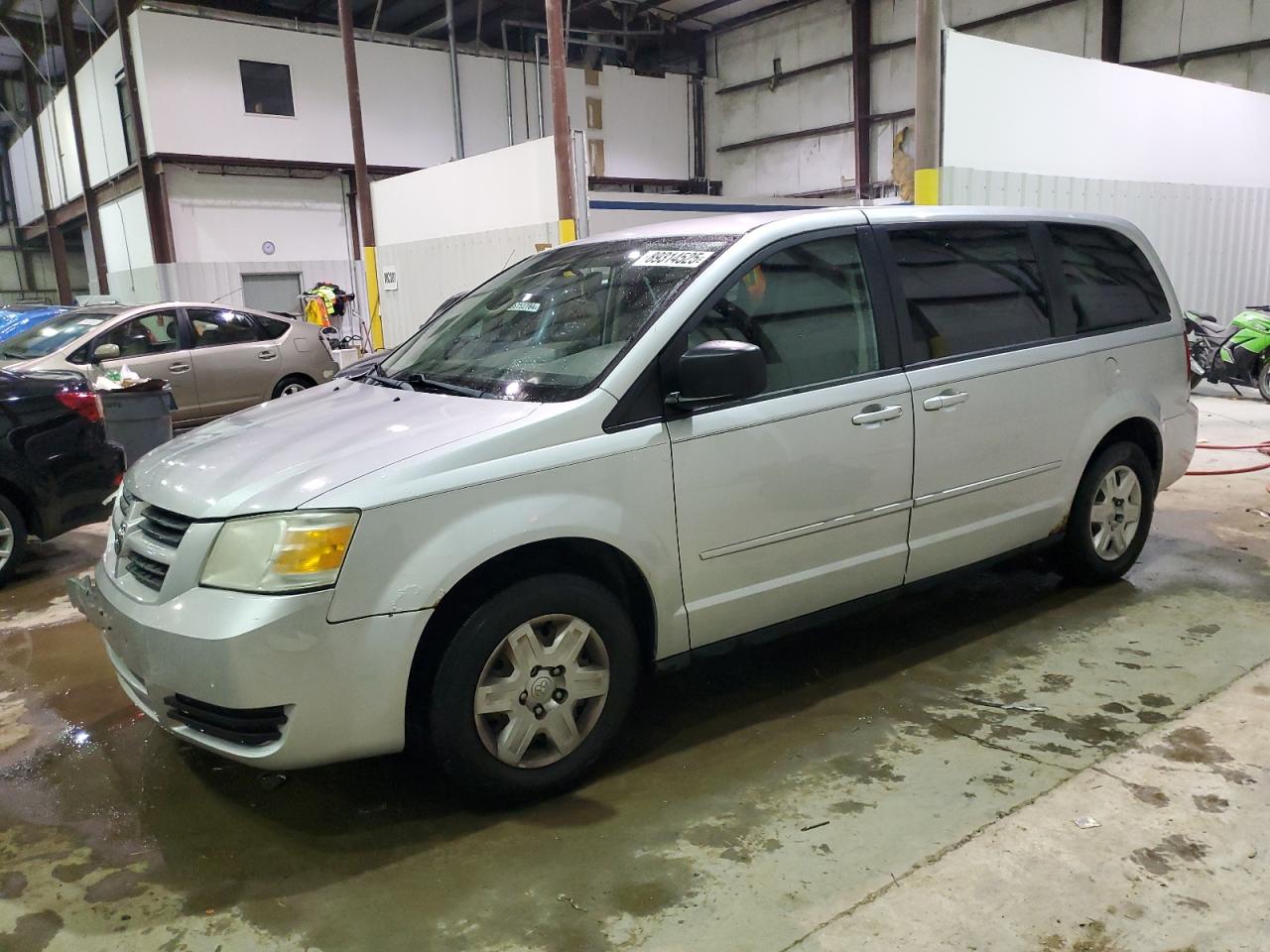2009 Dodge Caravan - Image 1