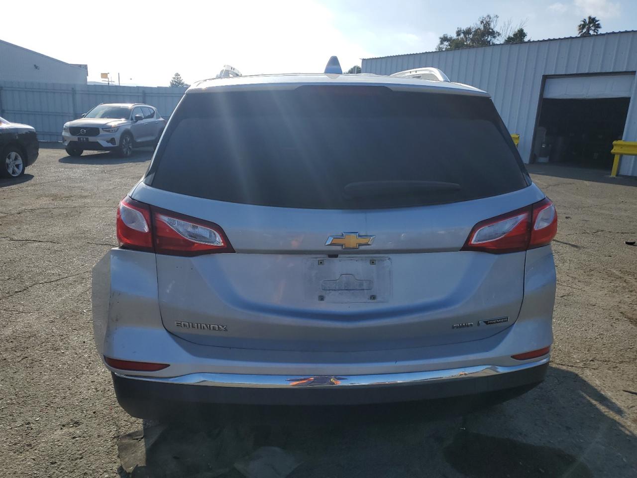 2018 Chevrolet Equinox Premier VIN: 2GNAXVEV7J6323382 Lot: 88986005