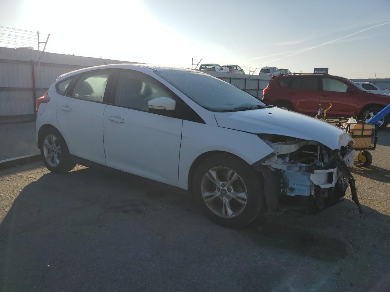 VIN 1FADP3K27DL200946 2013 FORD FOCUS no.4