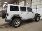 2011 Jeep Wrangler Unlimited Sahara продається в Blaine, MN - All Over