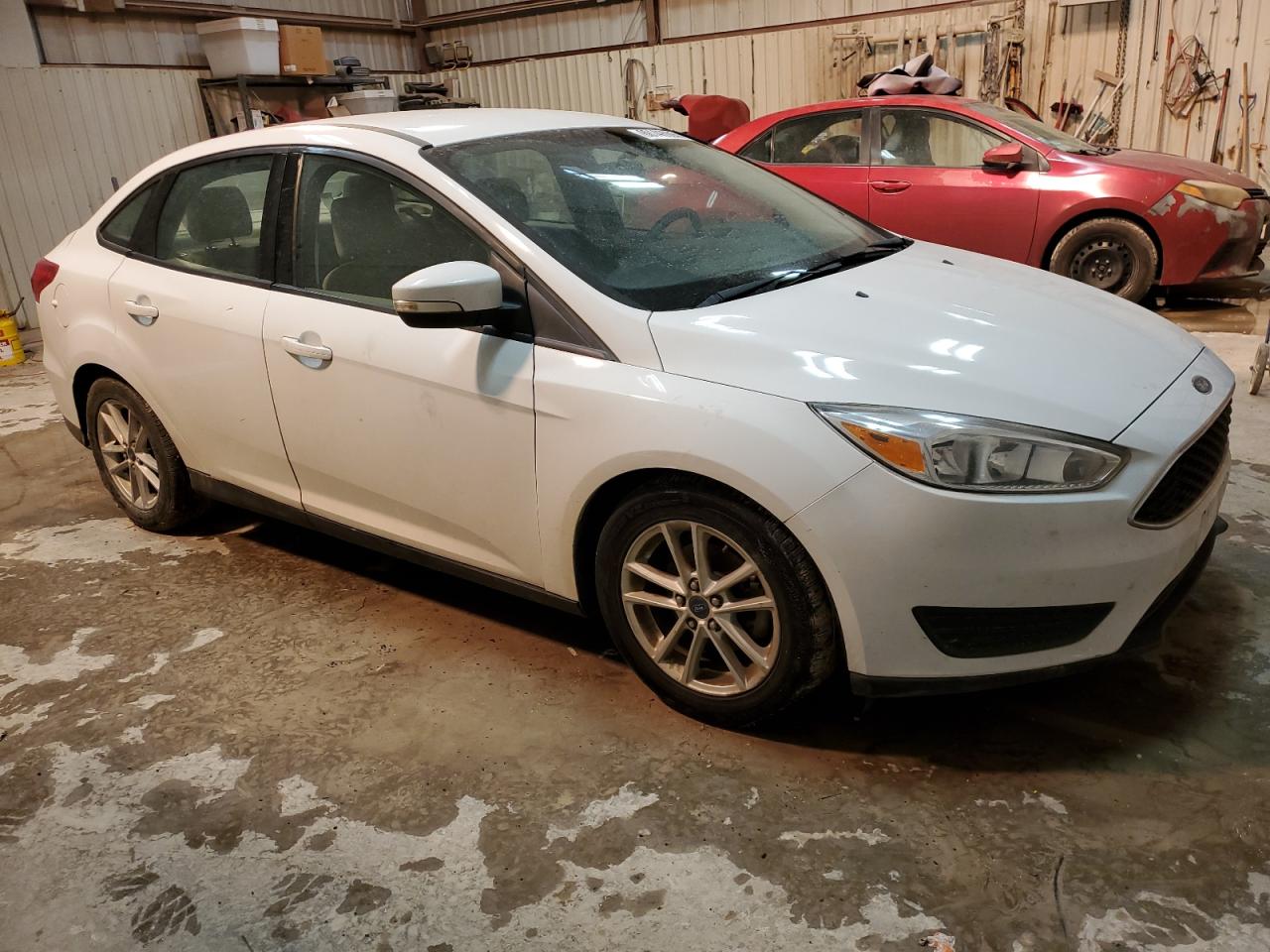 VIN 1FADP3F20FL384964 2015 FORD FOCUS no.4