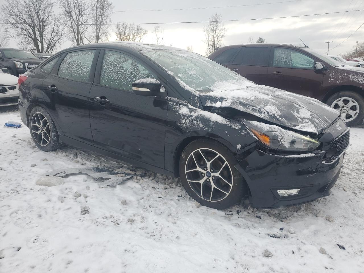 VIN 1FADP3H21HL272139 2017 FORD FOCUS no.4