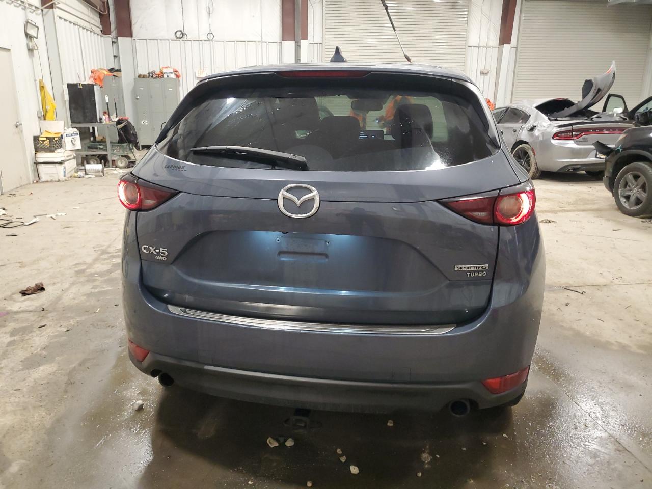 2021 Mazda Cx-5 Carbon Edition VIN: JM3KFBCY7M0370329 Lot: 43062325