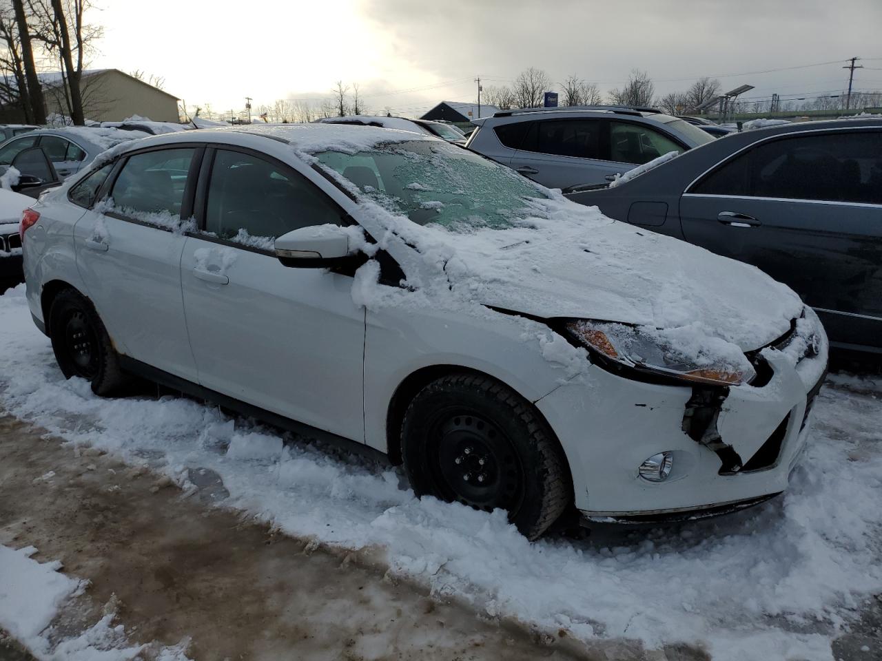 VIN 1FADP3F28DL348632 2013 FORD FOCUS no.4