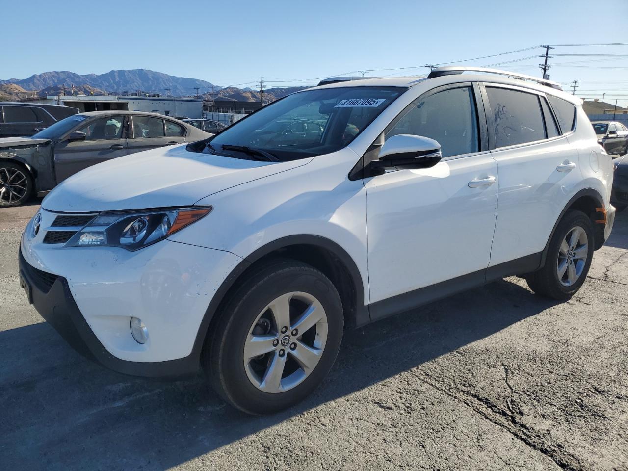 VIN 2T3WFREV4FW144947 2015 TOYOTA RAV4 no.1