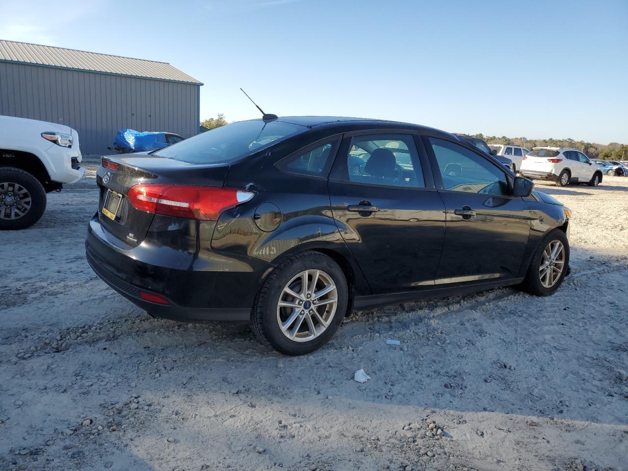 VIN 1FADP3F27GL201366 2016 FORD FOCUS no.3