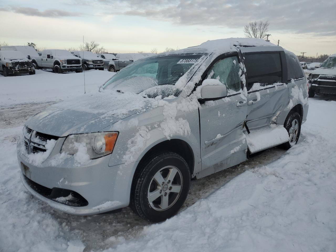 2012 Dodge Grand Caravan Sxt للبيع في Kansas City، KS - Side