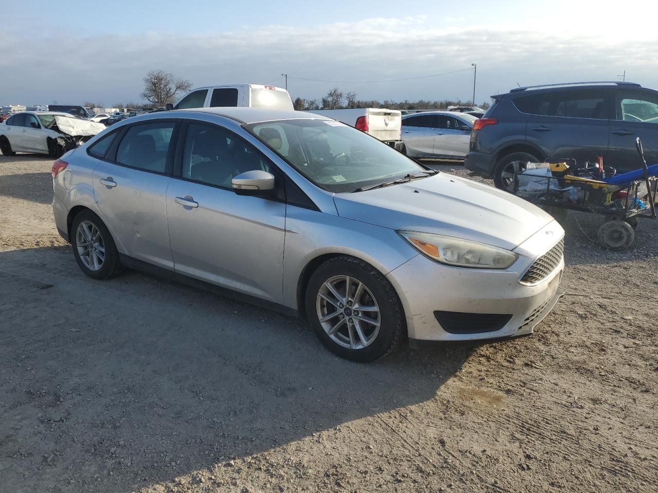 VIN 1FADP3F2XGL293458 2016 FORD FOCUS no.4