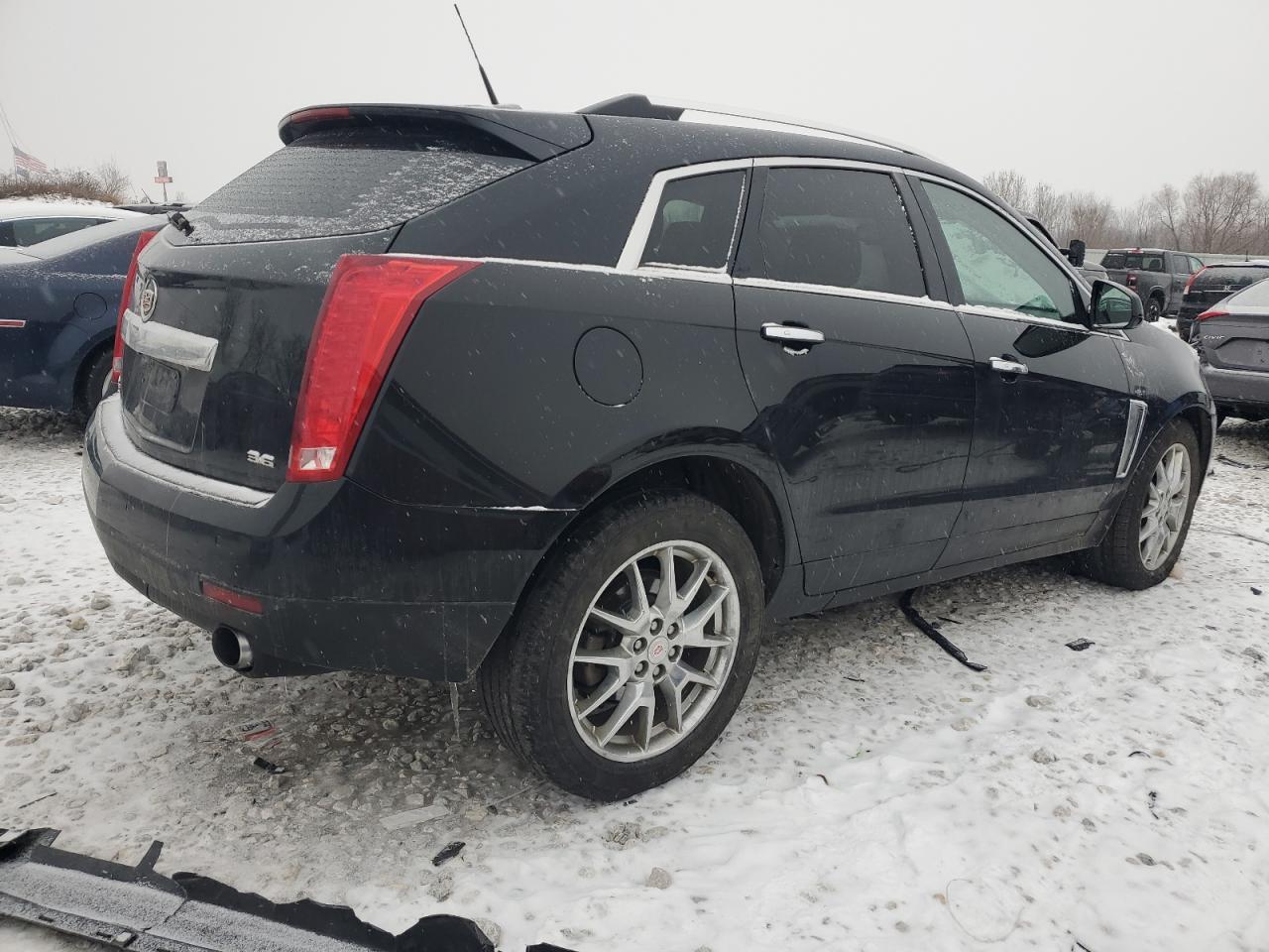 VIN 3GYFNJE3XDS618567 2013 CADILLAC SRX no.3