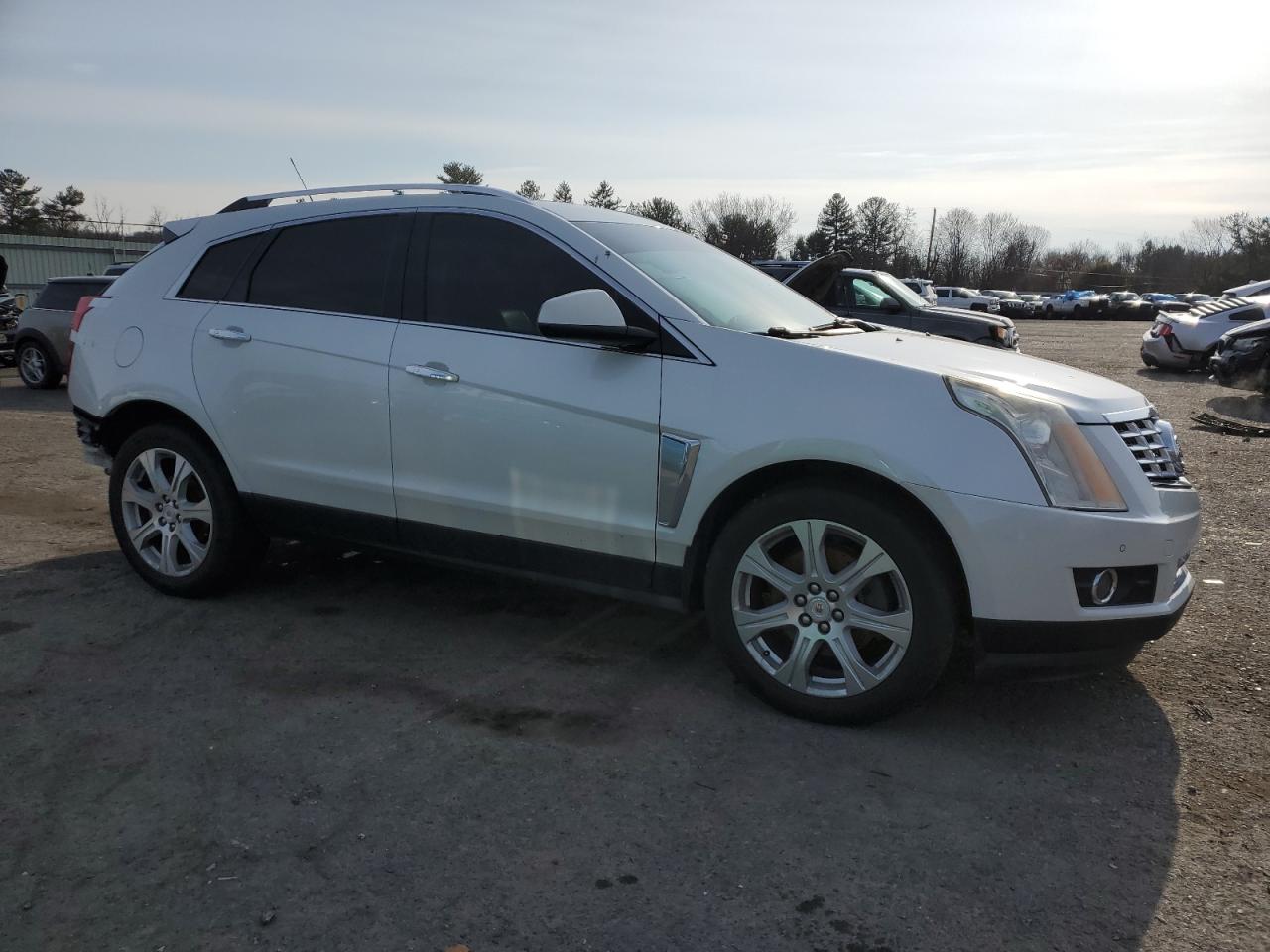 VIN 3GYFNFE39FS624327 2015 CADILLAC SRX no.4