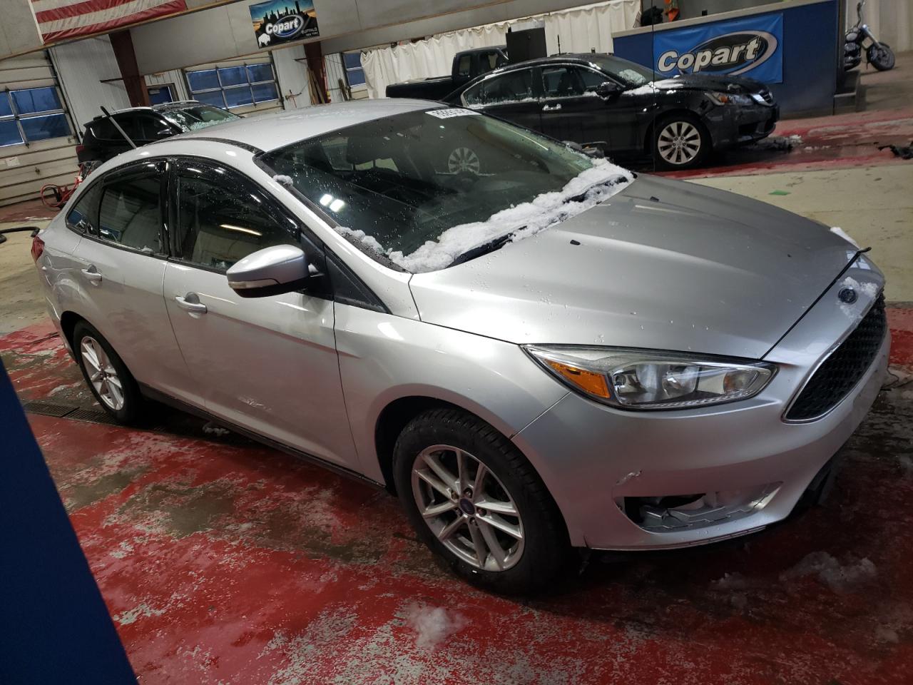 VIN 1FADP3F27FL217467 2015 FORD FOCUS no.4