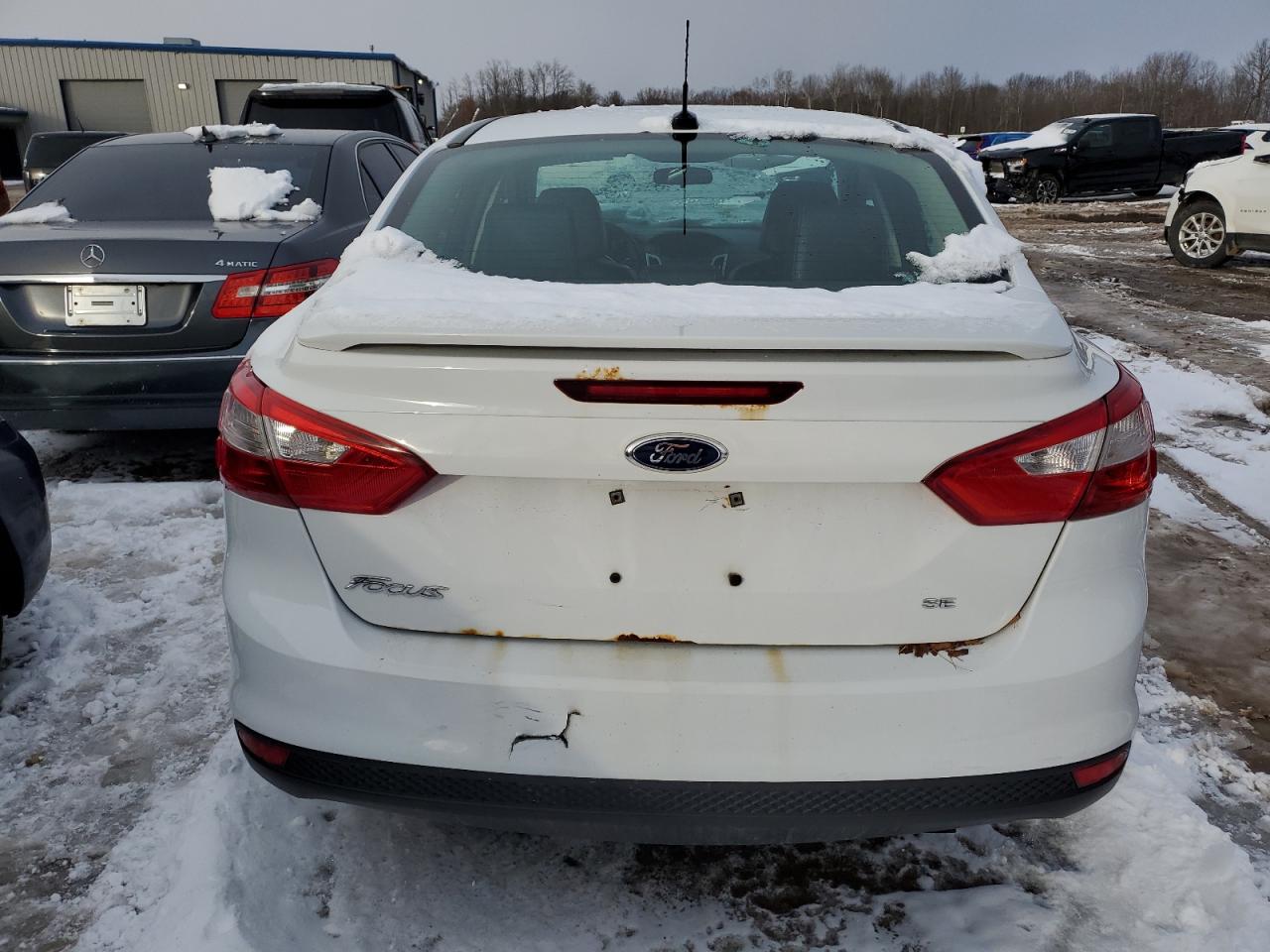 VIN 1FADP3F28DL348632 2013 FORD FOCUS no.6